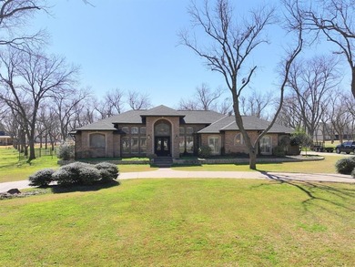 Beautifully situated on 2.3 private acres in the gated, golfing on Pecan Plantation Country Club in Texas - for sale on GolfHomes.com, golf home, golf lot