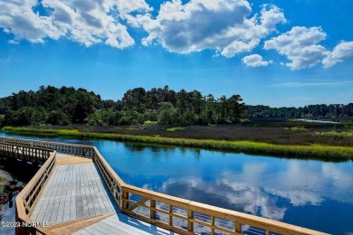 Nestled in the heart of the Shallotte Point area, this home on Rivers Edge Golf Club in North Carolina - for sale on GolfHomes.com, golf home, golf lot