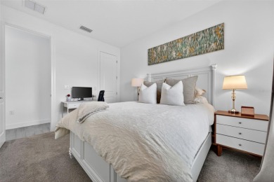 Experience modern luxury and effortless sophistication in this on Esplanade Golf and Country at Lakewood Ranch in Florida - for sale on GolfHomes.com, golf home, golf lot