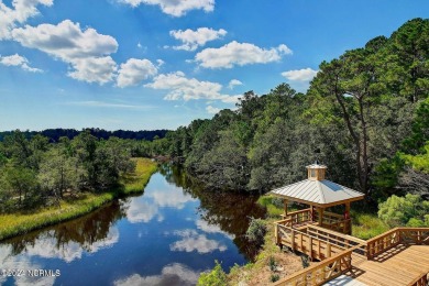 Nestled in the heart of the Shallotte Point area, this home on Rivers Edge Golf Club in North Carolina - for sale on GolfHomes.com, golf home, golf lot
