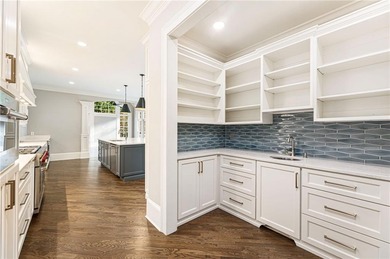 Stunning elegance overlooking the 14th green in gated White on White Columns Country Club in Georgia - for sale on GolfHomes.com, golf home, golf lot