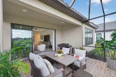 Experience modern luxury and effortless sophistication in this on Esplanade Golf and Country at Lakewood Ranch in Florida - for sale on GolfHomes.com, golf home, golf lot
