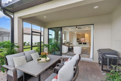 Experience modern luxury and effortless sophistication in this on Esplanade Golf and Country at Lakewood Ranch in Florida - for sale on GolfHomes.com, golf home, golf lot