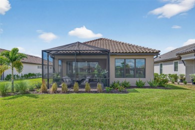Experience modern luxury and effortless sophistication in this on Esplanade Golf and Country at Lakewood Ranch in Florida - for sale on GolfHomes.com, golf home, golf lot