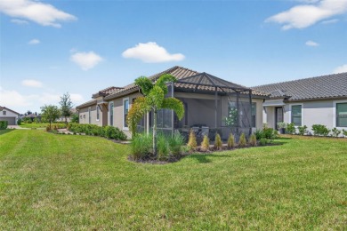 Experience modern luxury and effortless sophistication in this on Esplanade Golf and Country at Lakewood Ranch in Florida - for sale on GolfHomes.com, golf home, golf lot