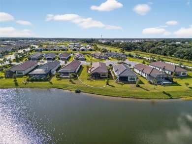 Experience modern luxury and effortless sophistication in this on Esplanade Golf and Country at Lakewood Ranch in Florida - for sale on GolfHomes.com, golf home, golf lot