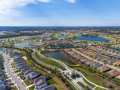 Experience modern luxury and effortless sophistication in this on Esplanade Golf and Country at Lakewood Ranch in Florida - for sale on GolfHomes.com, golf home, golf lot