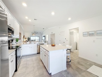 Beautifully decorated and meticulously maintained, this fully on Lakewood National Golf Club in Florida - for sale on GolfHomes.com, golf home, golf lot