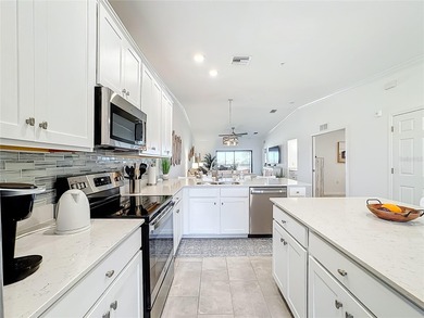 Beautifully decorated and meticulously maintained, this fully on Lakewood National Golf Club in Florida - for sale on GolfHomes.com, golf home, golf lot