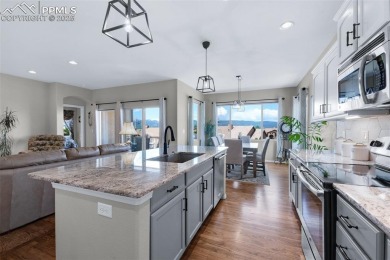 Elevated lot with unobstructed Pikes Peak and Front Range views on The Club At Flying Horse in Colorado - for sale on GolfHomes.com, golf home, golf lot