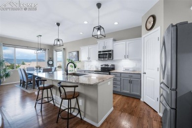 Elevated lot with unobstructed Pikes Peak and Front Range views on The Club At Flying Horse in Colorado - for sale on GolfHomes.com, golf home, golf lot