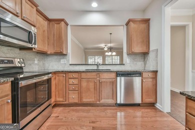 WHAT IS SPECIAL ABOUT THIS HOME? This Gray Myst is move-in ready on Reunion Golf Club in Georgia - for sale on GolfHomes.com, golf home, golf lot