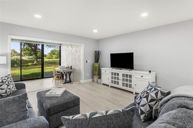 Your private Boca Lago retreat awaits! Exquisitely remodeled on Boca Lago Golf and Country Club in Florida - for sale on GolfHomes.com, golf home, golf lot