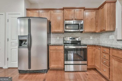 WHAT IS SPECIAL ABOUT THIS HOME? This Gray Myst is move-in ready on Reunion Golf Club in Georgia - for sale on GolfHomes.com, golf home, golf lot