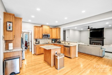 Discover your dream home, a spacious 5-bedroom, 2.5-bath on Highland Creek Golf Club in North Carolina - for sale on GolfHomes.com, golf home, golf lot