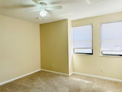 Discover the perfect blend of comfort, convenience, and income on Feather Sound Country Club in Florida - for sale on GolfHomes.com, golf home, golf lot