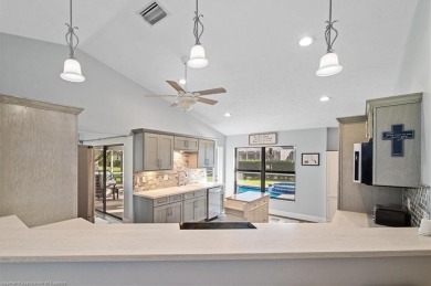 This beautiful 3BD/2BA pool home offers luxurious living in a on Sun n Lake Golf and Country Club in Florida - for sale on GolfHomes.com, golf home, golf lot