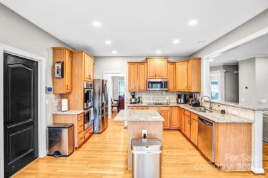 Discover your dream home, a spacious 5-bedroom, 2.5-bath on Highland Creek Golf Club in North Carolina - for sale on GolfHomes.com, golf home, golf lot