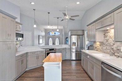 This beautiful 3BD/2BA pool home offers luxurious living in a on Sun n Lake Golf and Country Club in Florida - for sale on GolfHomes.com, golf home, golf lot