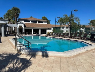 Discover the perfect blend of comfort, convenience, and income on Feather Sound Country Club in Florida - for sale on GolfHomes.com, golf home, golf lot