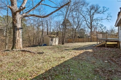 This beautifully updated 3-bedroom, 2-bathroom home in Bella on Bella Vista Country Club - Kingswood in Arkansas - for sale on GolfHomes.com, golf home, golf lot