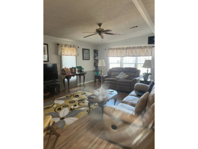 2 Bedroom | 2 Bath | 1,152 sq ft | $57,900    This on Lake Henry Golf Club in Florida - for sale on GolfHomes.com, golf home, golf lot