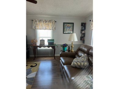 2 Bedroom | 2 Bath | 1,152 sq ft | $57,900    This on Lake Henry Golf Club in Florida - for sale on GolfHomes.com, golf home, golf lot