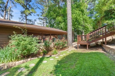 Enjoy breathtaking lake views from nearly every room in this on Hide-A-Way Lake Golf Course in Texas - for sale on GolfHomes.com, golf home, golf lot