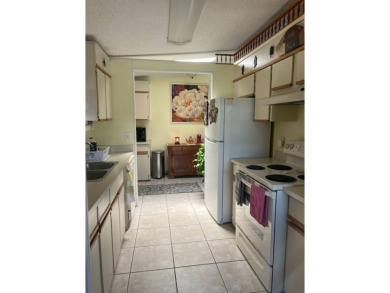 2 Bedroom | 2 Bath | 1,152 sq ft | $57,900    This on Lake Henry Golf Club in Florida - for sale on GolfHomes.com, golf home, golf lot
