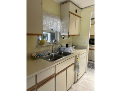 2 Bedroom | 2 Bath | 1,152 sq ft | $57,900    This on Lake Henry Golf Club in Florida - for sale on GolfHomes.com, golf home, golf lot