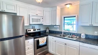 Welcome to Old Bridge Village, a friendly 55+ community, located on Riverbend Golf and Country Club in Florida - for sale on GolfHomes.com, golf home, golf lot