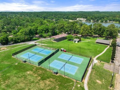 Enjoy breathtaking lake views from nearly every room in this on Hide-A-Way Lake Golf Course in Texas - for sale on GolfHomes.com, golf home, golf lot