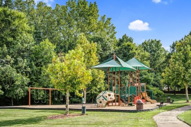 Discover your dream home, a spacious 5-bedroom, 2.5-bath on Highland Creek Golf Club in North Carolina - for sale on GolfHomes.com, golf home, golf lot