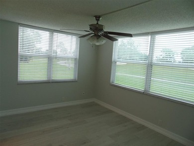 Owner wants this sold Now, ASAP. ALL IMPACT WINDOWS. FIRST FLOOR on Oriole Golf and Tennis Club in Florida - for sale on GolfHomes.com, golf home, golf lot