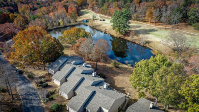 Beautiful Townhome with Sunroom overlooking golf course. for sale on GolfHomes.com