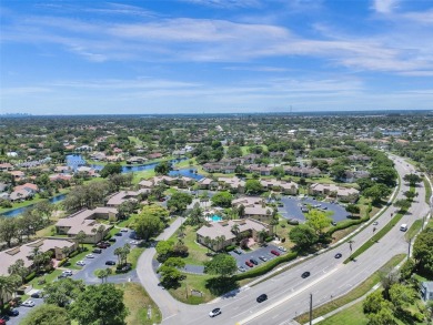 Welcome to your dream condo in the sought-after community of on Woodmont Country Club in Florida - for sale on GolfHomes.com, golf home, golf lot