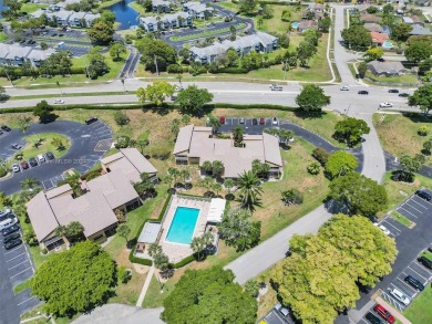 Welcome to your dream condo in the sought-after community of on Woodmont Country Club in Florida - for sale on GolfHomes.com, golf home, golf lot