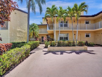 Welcome to your dream condo in the sought-after community of on Woodmont Country Club in Florida - for sale on GolfHomes.com, golf home, golf lot