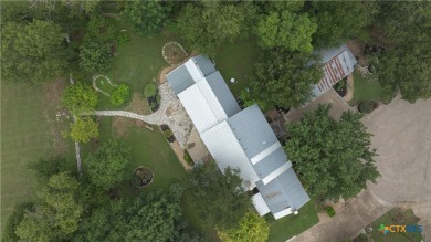 Tucked within a serene, tree-lined cul-de-sac, this timeless New on Mill Creek Golf Club in Texas - for sale on GolfHomes.com, golf home, golf lot