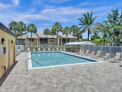 Welcome to your dream condo in the sought-after community of on Woodmont Country Club in Florida - for sale on GolfHomes.com, golf home, golf lot