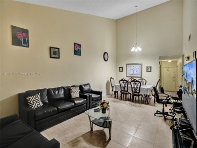 Welcome to your dream condo in the sought-after community of on Woodmont Country Club in Florida - for sale on GolfHomes.com, golf home, golf lot