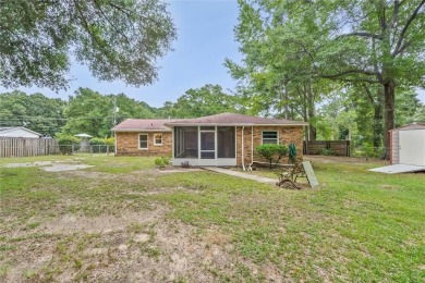 Welcome to this charming 1,530 square foot brick and slab, low on Magnolia Grove Golf Club in Alabama - for sale on GolfHomes.com, golf home, golf lot
