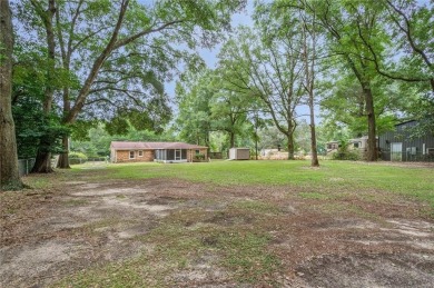 Welcome to this charming 1,530 square foot brick and slab, low on Magnolia Grove Golf Club in Alabama - for sale on GolfHomes.com, golf home, golf lot