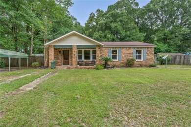 Welcome to this charming 1,530 square foot brick and slab, low on Magnolia Grove Golf Club in Alabama - for sale on GolfHomes.com, golf home, golf lot