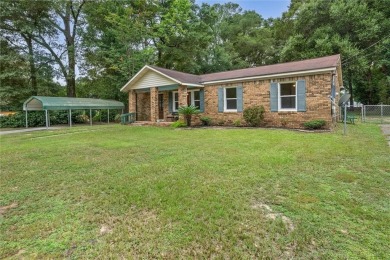Welcome to this charming 1,530 square foot brick and slab, low on Magnolia Grove Golf Club in Alabama - for sale on GolfHomes.com, golf home, golf lot
