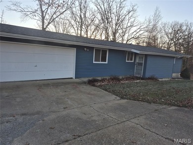 Don't miss this wonderful updated ranch home on in the Private on Terre Du Lac Golf and Country Club in Missouri - for sale on GolfHomes.com, golf home, golf lot