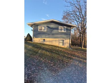 Don't miss this wonderful updated ranch home on in the Private on Terre Du Lac Golf and Country Club in Missouri - for sale on GolfHomes.com, golf home, golf lot