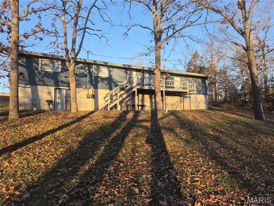 Don't miss this wonderful updated ranch home on in the Private on Terre Du Lac Golf and Country Club in Missouri - for sale on GolfHomes.com, golf home, golf lot