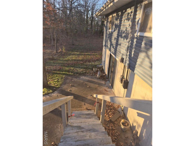 Don't miss this wonderful updated ranch home on in the Private on Terre Du Lac Golf and Country Club in Missouri - for sale on GolfHomes.com, golf home, golf lot