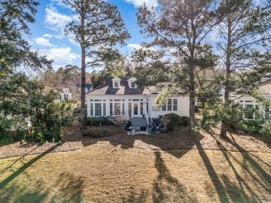 Immaculate Lakefront Gem in the Heart of Pawleys Island  Nestled on The Reserve Golf Club at Pawleys Island in South Carolina - for sale on GolfHomes.com, golf home, golf lot